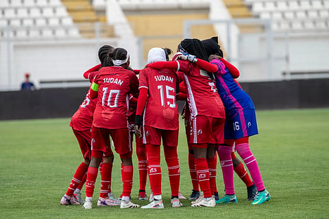 Sudan's U-17 women's national team warms up before a soccer match against Comoros, during qualifiers for the 2028 Los Angeles Summer Olympics, in Casablanca, Morocco, Monday, June 8, 2026.
