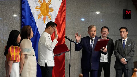 New Senate President Sherwin Gatchalian, third from left, takes his oath during a special session at the Philippine Senate in Pasay City, Philippines, on Wednesday, June 17, 2026. 