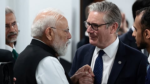 British Prime Minister Keir Starmer with Prime Minister Narendra Modi