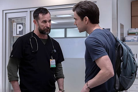 Noah Wyle (L) and Patrick Ball (R) in a still from The Pitt