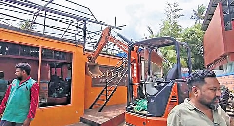 Demolition under way at North Cliff in Varkala on Thursday