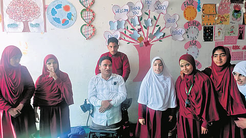 Javed Ahmad Tak with students