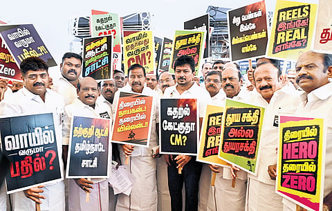 DMK MLAs, led by floor leader Udhayanidhi Stalin, displaying placards criticising CM Vijay at the inaugural session of the state Assembly on Thursday