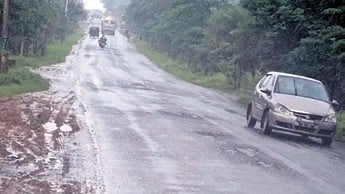 A road in Jeypore wears a deserted look during rain on Wednesday.
