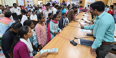 Students are participating in the special higher education grievance redressal camp at collectorate in Madurai.