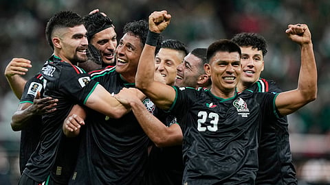 Mexico's Luis Romo, third left, celebrates with his teammates after scoring g his team's first goal during the World Cup Group A soccer match between Mexico and South Korea on June 18, 2026. 