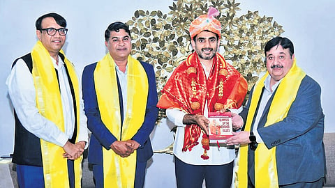 Higher Education Commissioner Narayana Bharat Gupta and JSS AHER Pro-Chancellor B Suresh exchange an MoU to establish a JSS AHER off-campus centre in Tirupati, in the presence of HRD Minister Nara Lokesh.