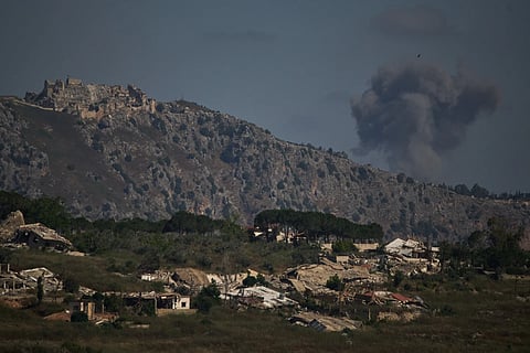 Smoke rises to the sky in an area near Beaufort Castle following an Israeli military strike in southern Lebanon as seen from northern Israel, Friday, June 19, 2026.