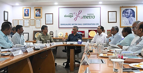 Minister Krishna Byre Gowda hold a meeting with the officials of BMRCL at the head office in Bengaluru on Friday.