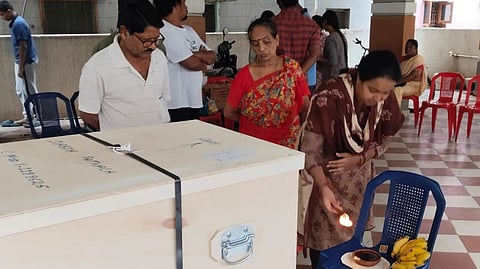 Family members and relatives pay their last respects after the mortal remains of marine engineer Patnala Suresh arrived in Visakhapatnam on Friday. 