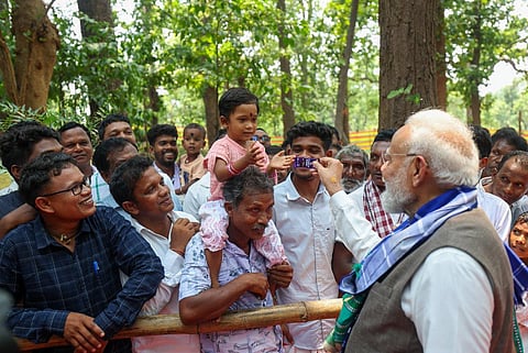 Villagers accorded him a traditional welcome with drumbeats and tribal dances.