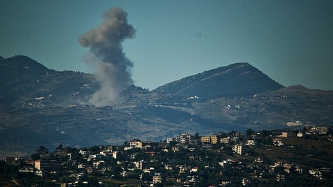 Smoke rises to the sky following an Israeli military strike in southern Lebanon as seen from northern Israel, Friday, June 19, 2026. 