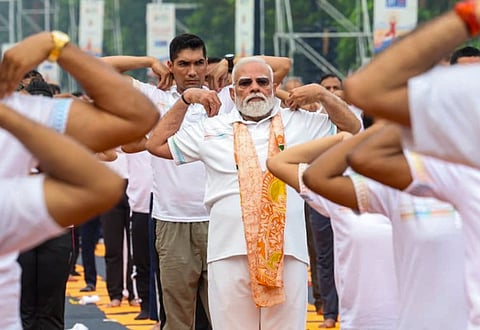 Prime Minister Narendra Modi participates in a yoga session during the International Day of Yoga celebrations, in Kolkata.