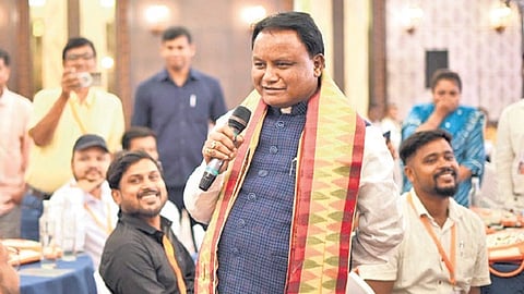 Chief Minister Mohan Charan Majhi interacting with social media influencers.