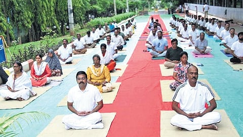 Under the guidance of yoga experts, participants performed various yoga asanas for nearly an hour. 
