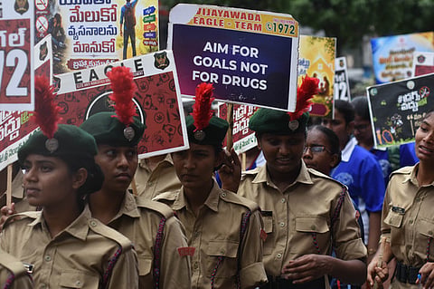 Students taking part in a rally organised by NTR district EAGLE officials on the eve of International Day Against Drug Abuse and Illicit Trafficking