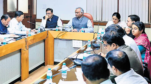 Home Minister Priyank Kharge with Chief Secretary Shalini Rajneesh and DG&IGP MA Saleem at a conference in Bengaluru.
