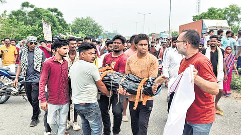 Sibaprasad Barik’s body being recovered from the area on Sunday.