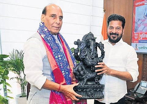 Chief Minister A Revanth Reddy greets Defence Minister Rajnath Singh at Kartavya Bhavan in New Delhi on Monday