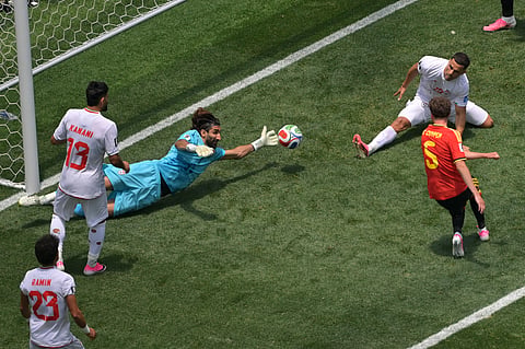 Alireza Beiranvand denies Maxime De Cuyper during the match in Los Angeles