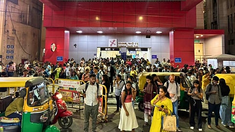 Severe crowding seen in front of Cubbon Park Metro Station after a train developed a technical fault in the underground section, in Bengaluru on Tuesday. 