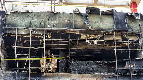 A commercial building in Aliganj caught fire on Monday.