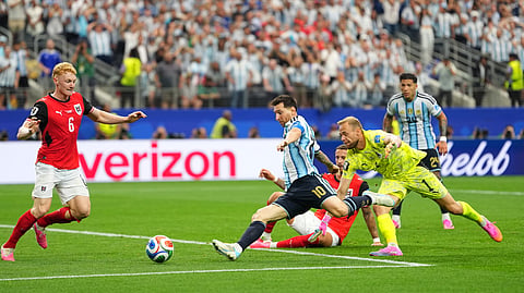Argentina's Lionel Messi, center, scores his side's second goal during the World Cup Group J soccer match between Argentina and Austria in Arlington, Texas, near Dallas, Monday, June 22, 2026. 