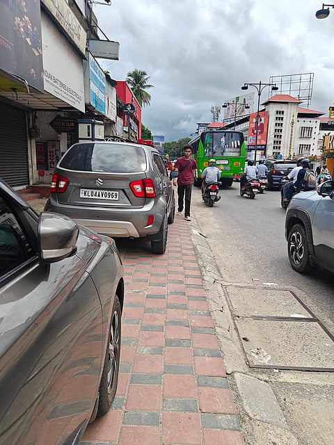 Footpaths for people, not vehicles: Kochi’s walkways remain a battle zone