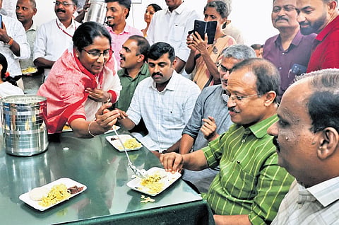 Deputy Speaker Shanimol Osman serving jackfruit dishes to MLA V Muraleedharan at the jackfruit festival organised by the Jackfruit Promotion Council at the assembly canteen on Tuesday. MLAs Abin Varkey, T P Ashraf Ali and B B Gopakumar are also seen.