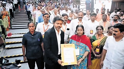 CM C Joseph Vijay stepped down from the podium to hand over the appointment order to a pregnant woman, R Akshaya Lakshmi, on Wednesday.