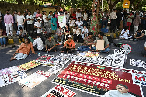 Protests calling for Education minister Dharmendra Pradhan's resgination in New Delhi.