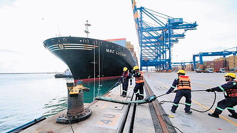 Workers docking the MSC Luciana at the Vizhinjam International Seaport on Wednesday.