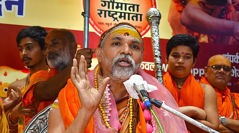 In this photo from June 16, 2026, Shankaracharya Swami Avimukteshwaranand Saraswati Maharaj speaks during the Gau-Raksharth-Dharmyuddh Yatra in Ghaziabad.