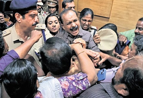 LDF councillors gherao Mayor V V Rajesh and prevent him from entering his chamber 