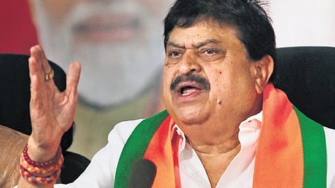 State BJP chief N Ramchander Rao gestures as he addresses the media in Hyderabad.
