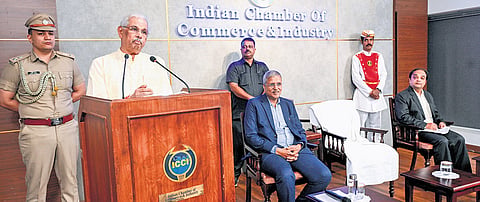Governor Rajendra Arlekar speaking at an interaction hosted by the Indian Chamber of Commerce and Industry. Chamber president Rajkumar Gupta is also seen 