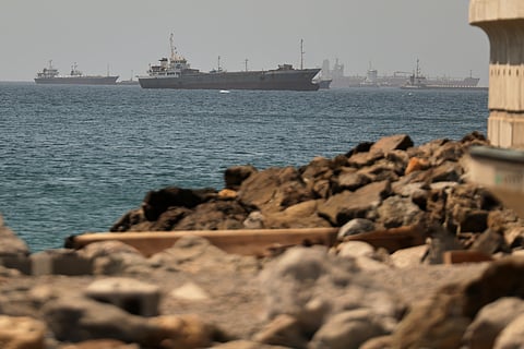 Tankers and cargo vessels are seen in the Gulf of Oman, along shipping routes linking the Strait of Hormuz and the Arabian Sea, Tuesday, June 16, 2026.