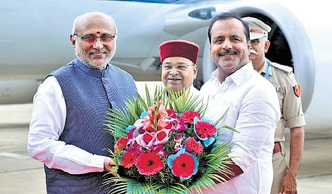 Vice President CP Radhakrishnan with Governor Thaawarchand Gehlot and Minister UT Khader in Bengaluru on Saturday 