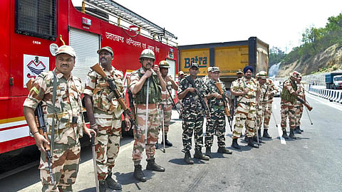 Security personnel stands guard at the Dehradun-Himachal border.