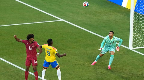 Colombia's Jhon Cordoba (9) shoots against Portugal's Renato Veiga (13) and goalkeeper Diogo Costa (1) during the World Cup Group K soccer match between Colombia and Portugal in Miami Gardens, Fla., Saturday, June 27, 2026.