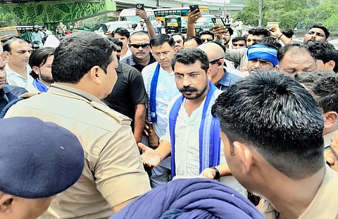Azad alleged that police personnel misbehaved with him and used abusive language.