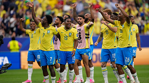 Brazil players celebrate after the World Cup round of 32 soccer match between Brazil and Japan in Houston, Monday, June 29, 2026. 