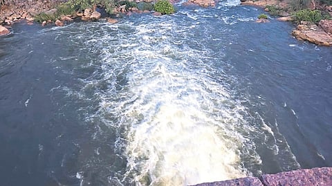 Water gushes out of Himayatsagar reservoir after HMWSSB officials lifted the floodgates at 6 pm on Sunday.