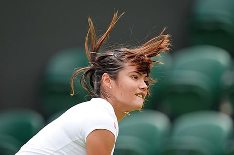 Emma Raducanu of Britain returns a shot, during a practice session, ahead of the Wimbledon Tennis Championships, at the All England Lawn Tennis and Croquet Club, in London, Saturday, June 27, 2026