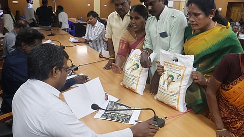 BJP cadres from Vilangudi have alleged that PDS rice is being distributed in welfare rice bags carrying the logo of the TVK party.