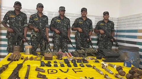 The seized arms and explosives displayed at the district police office on Sunday.