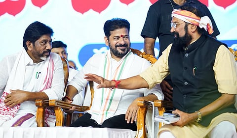 Chief Minister A Revanth Reddy along with Deputy Chief Minister Mallu Bhatti Vikramarka and Irrigation Minister N Uttam Kumar Reddy during a public meeting at Nagarjuna Govt Degree College Grounds in Nalgonda.