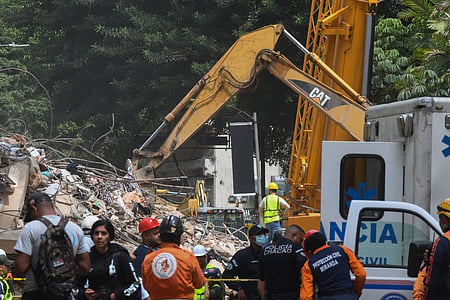 Chacao: An excavator works on a collapsed building in Chacao, Venezuela.