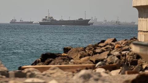 Tankers and cargo vessels are seen in the Gulf of Oman, along shipping routes linking the Strait of Hormuz and the Arabian Sea, Tuesday, June 16, 2026.