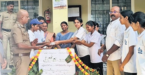 SPC cadets and officers launching Kanivu project at Govt HSS, Marayamuttom